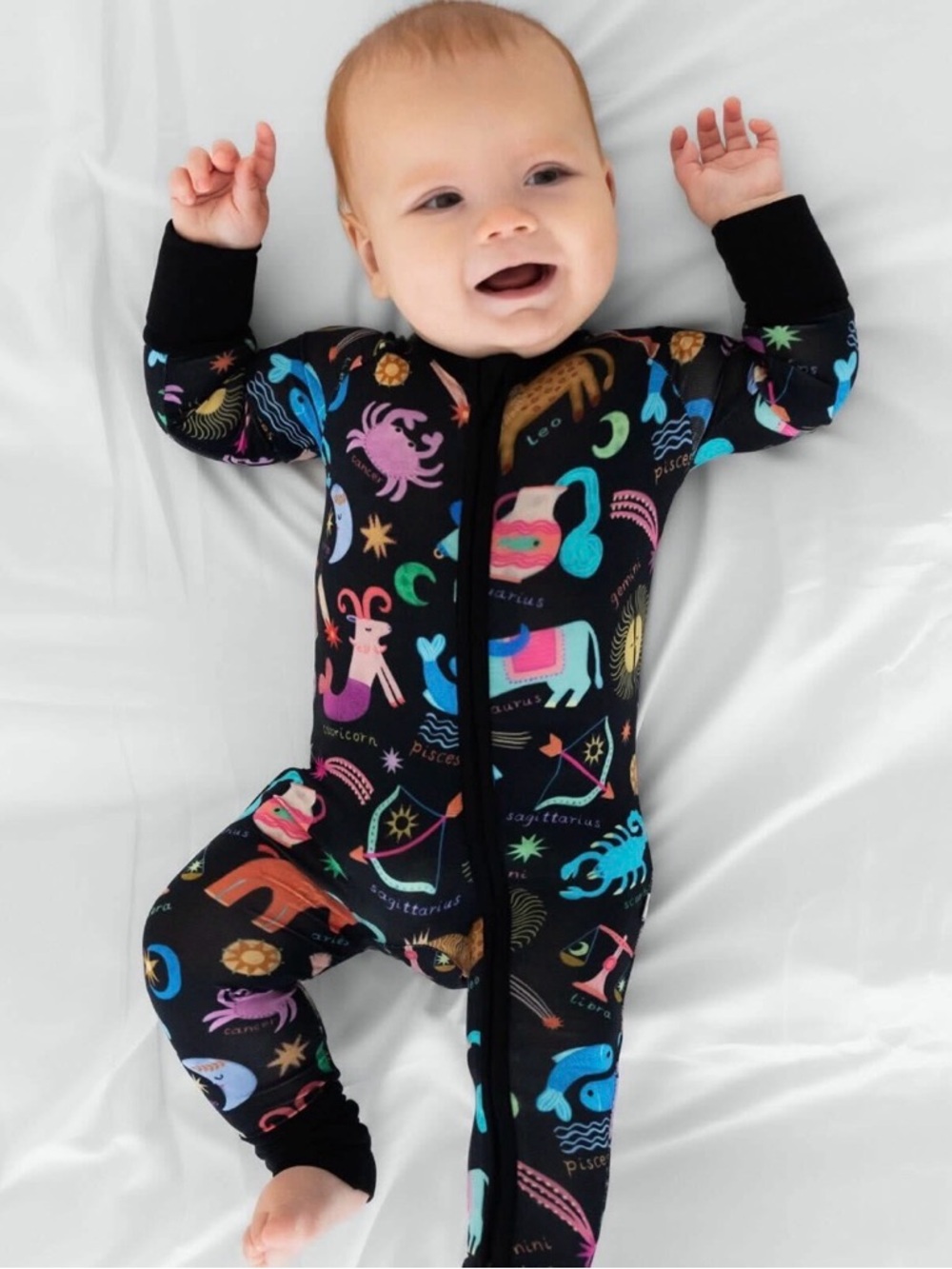 Little Sleepies- Star Signs Print Zippy